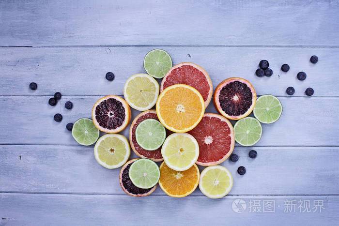 各种各样的柑橘类水果和蓝莓照片-正版商用图片0omtz1-摄图新视界